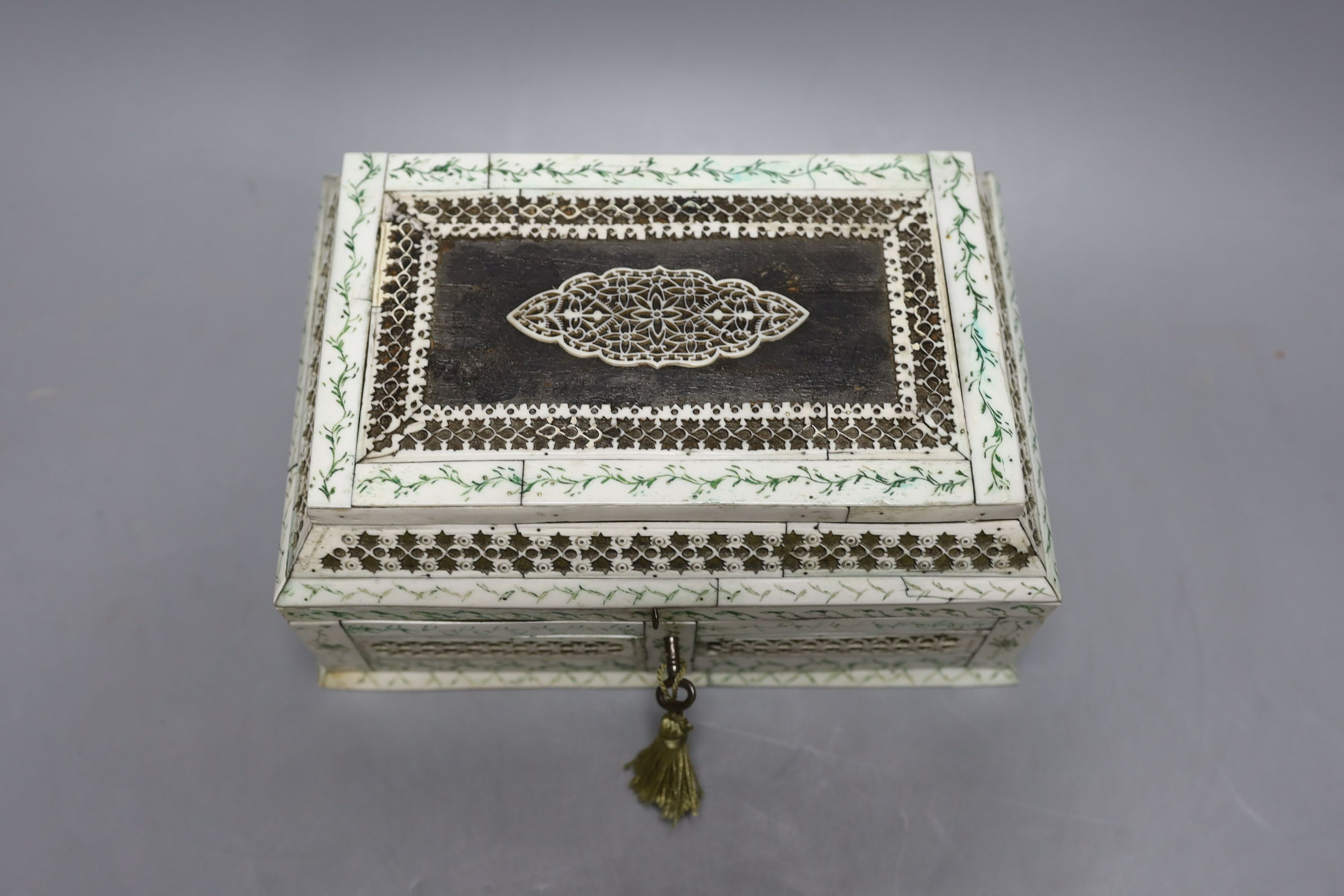 A 19th century Indian bone and ivory veneered sewing casket - 12cm tall